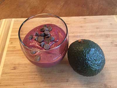 deep purple avocado smoothie in glass